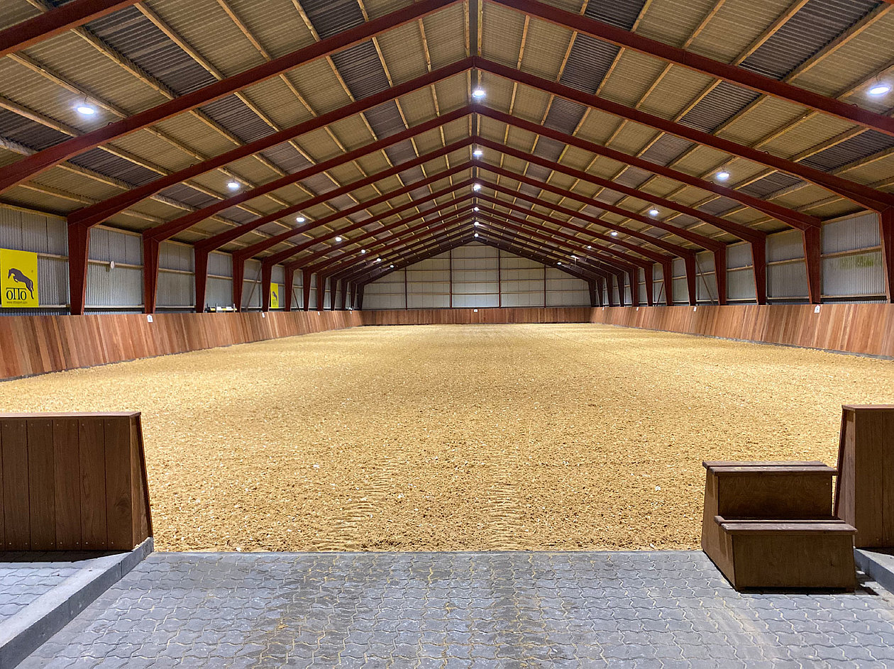 Self-built indoor arena surface in Denmark